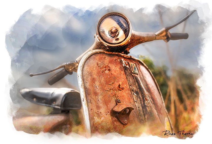 A rusting vintage Vespa scooter, partially hidden in tall weeds, reflecting years of beautiful patina.